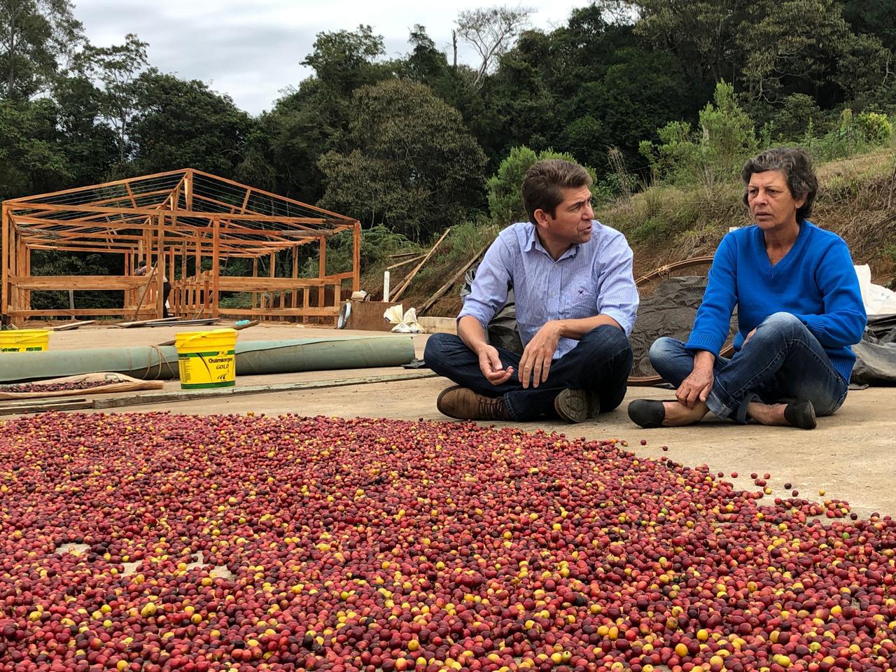 Bispo team with coffee producer at the drying yard